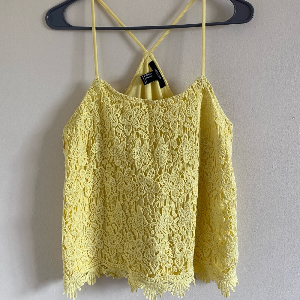 Yellow sleeveless blouse